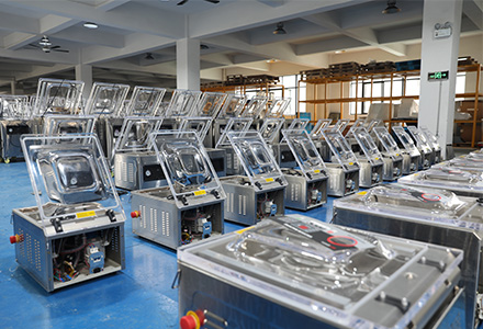 Vacuum packing machine manufacturing facility in China showing production assembly line