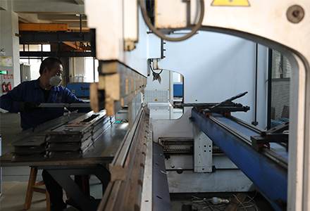 Vacuum packing machine manufacturing facility in China showing production assembly line